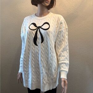 Chic White Cable Knit Sweater with Black Bow